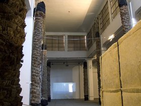 Jasmina Metwaly, Bar-Fly, 2010, single channel projection, mixed media (glass sheet, video projection). Installation detail, Paradise Paradise, Townhouse gallery, Cairo, 2010. Courtesy of the artist and Townhouse gallery, Cairo.