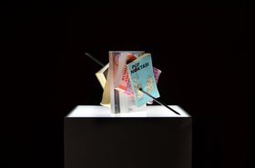 Slavs and Tatars, Kitab Kebab, 2012. Books, glue, skewer, 50 x 50 x 50 cm.