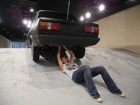 Silke Schmickl 'repairing' Ahmet &Ouml;ğ&uuml;t, Across the Slope, 2008, installation view, SALT, Istanbul. Photograph by Romain Kronenberg. 