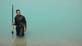 Lida Abdul, still from What We Have Overlooked, 2011, 16mm film, 2 channel video installation. Courtesy the aritst and Galleria Persano, Turin Italy.