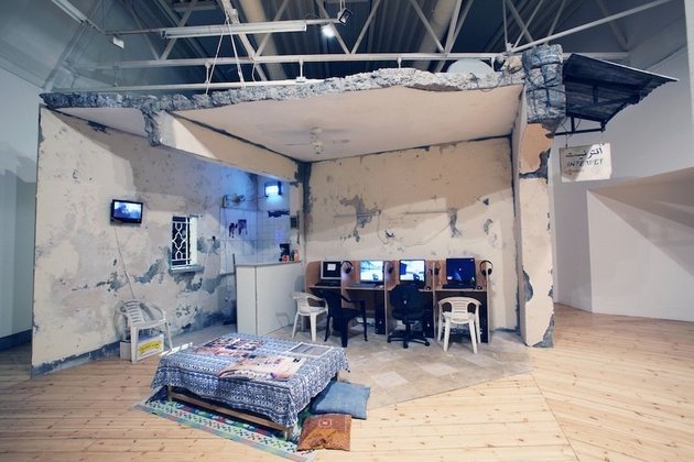 Wafaa Bilal, Virtual Jihadi, 2008, interactive video game, installation view, Subversion, Cornerhouse, Manchester, 2012. Set design by Kev Thornton. Photograph by Paul Greenwood. Courtesy and © the artist and Cornerhouse, Manchester.