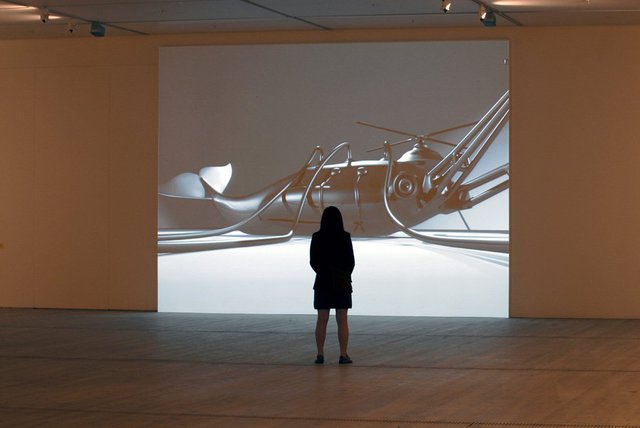 Mona Marzouk, The Bride Stripped Bare by Her Energy's' Evil, 2006, two large scale wall paintings (10 m each + acrylic colors), audio elements and a projected short 3D animated film, 2 min. 44 sec. Installation view at BALTIC Centre for Contemporary Art, Gateshead, UK.