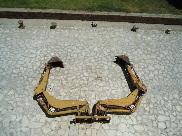 Nida Sinnokrot, KA (Carthage), 2012, 2 CAT 428D backhoe arms. Courtesy the artist. Photograph &copy; ATP/Ibraaz Publishing, 2012. 