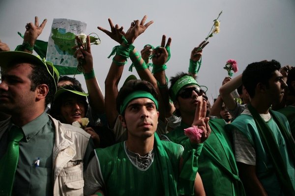 <p>Newsha Tavakolian, 2011</p><p>Photograph</p><p>Courtesy of the artist</p><p>Â </p><p>10: Supporters of Mir-Hossein Mousavi, the main challenger of incumbent President Ahmadinejad, during a rally in which they formed a human chain along Tehran's main artery, the 12-mile-long Vali-e Asr street. They dress in green as this is chosen as the signature colour for Mousavi.</p>&nbsp;