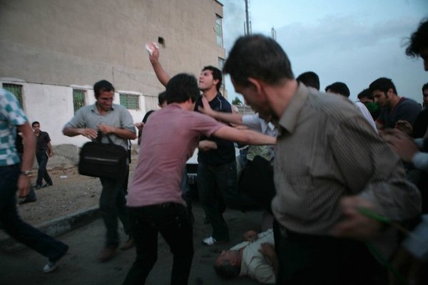 <p>Newsha Tavakolian, 2011</p><p>Photograph</p><p>Courtesy of the artist</p><p>Â </p><p>18: Members of the voluntary paramilitary force, the baseej, shot and killed one man and wounded others in a one million strong crowd of supporters of Mir-Hossein Mousavi.</p>&nbsp;