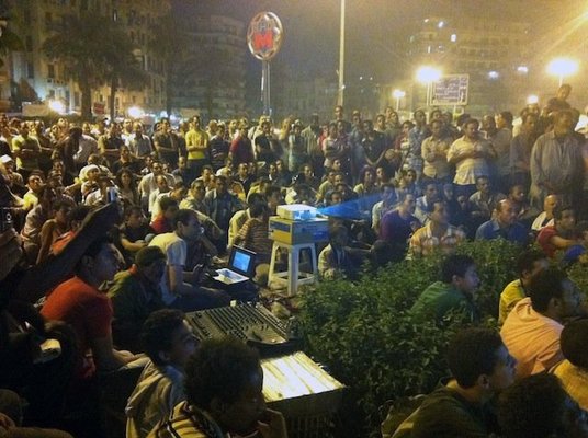 <p><em>Tahrir Cinema</em>Â </p><p>Tahrir Square, Cairo, July sit-in, 2011</p><p>Photographs posted on <em>Tahrir Cinema</em> Facebook page by the audience</p>&nbsp;