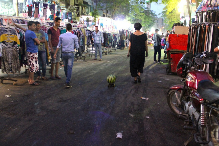 Heba Amin, Walking the Watermelon in Cairo, public performance.