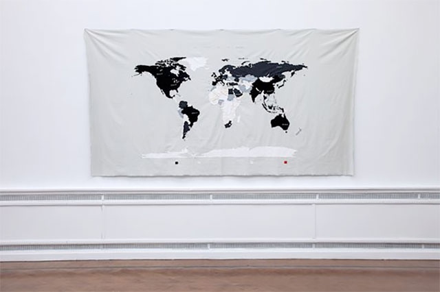 Mona Vatamanu and Florin Tudor, Le monde et la dette, 2016. Textile, 300 x 150 cm. Installation view at EVA International &ndash; Ireland&rsquo;s Biennial 2016.