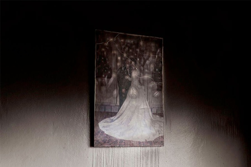 Carole Alfarah. Arabic writing on a bullet-pocked wall, inside a destroyed school, reads &laquo; To God, we belong to Him we shall return &raquo;. Homs, Syria, 2014.