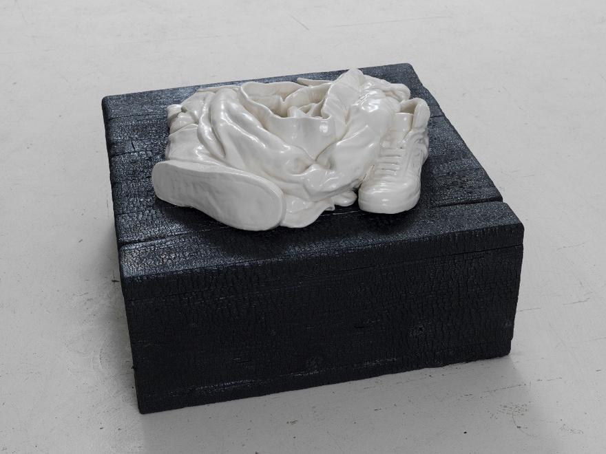 Reza Aramesh, Action 145: Friday April 25, 2003 at 07:55, 2015. Hand sculpted porcelain on charred wood plinth.