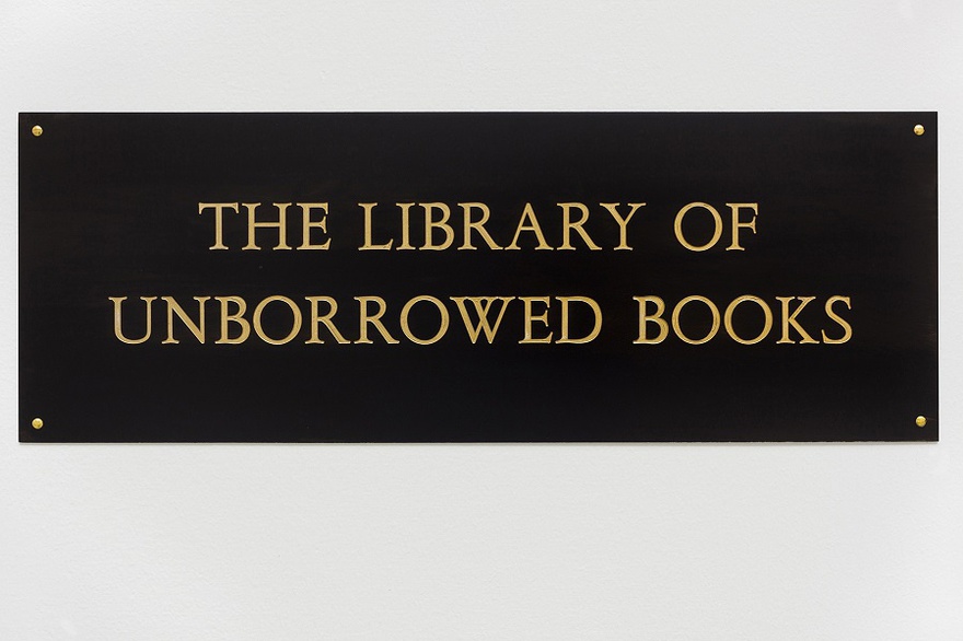 Meri&ccedil; Algun Ringborg, The Library of Unborrowed Books, 2012. Site-specific installation with books, shelves, brass sign, two contracts. Section I: Stockholms Stadsbibliotek (Stockholm Public Library), 2012 at Konstakademien, Stockholm.