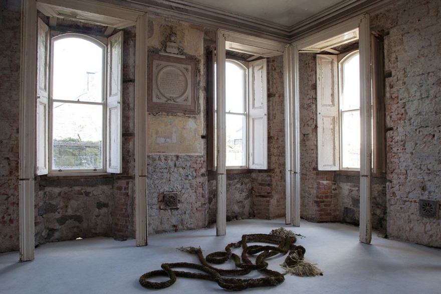 Michael Joo, This beautiful striped wreckage (which we interrogate)&hellip;, 2016. Intervention in existing site (three part installation with displaced architraves, found objects and video projection).