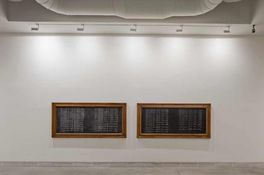 Adrian Piper, Everything 21, 2010-2013. Four boards in vintage picture frames with lacquered wood, each mounted on a wall at eye level, oriented horizontally and covered with a single phrase handwritten in cursive, in white chalk and repeated 25 times. 120 x 250 cm each. 56th International Art Exhibition - la Biennale di Venezia, All the World&rsquo;s Futures.